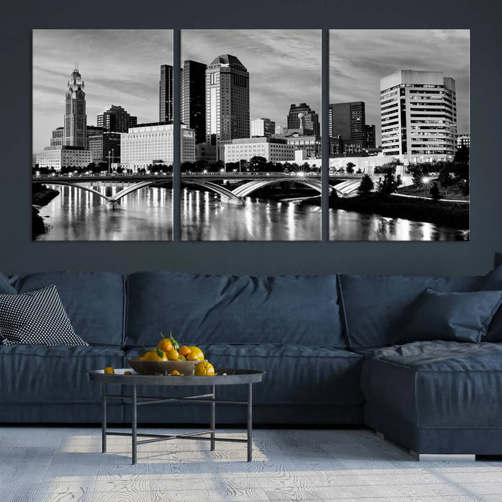 Columbus City Lights Skyline Black and White Wall Art Cityscape Canvas Print, featuring a city skyline over a river, is elegantly displayed.