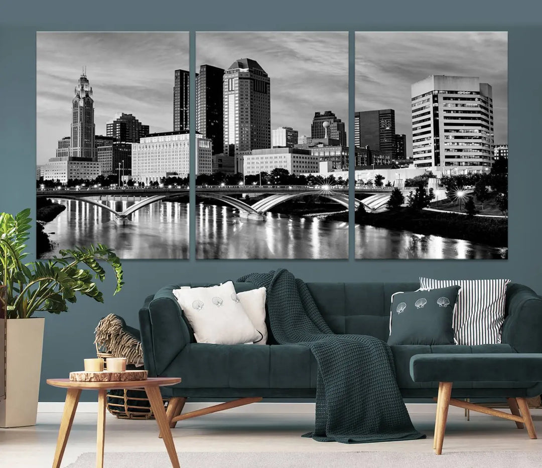 Columbus City Lights Skyline Black and White Wall Art Cityscape Canvas Print, featuring a city skyline over a river, is elegantly displayed.