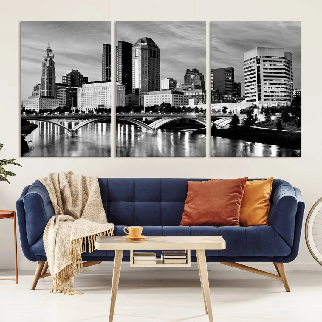 Columbus City Lights Skyline Black and White Wall Art Cityscape Canvas Print, featuring a city skyline over a river, is elegantly displayed.