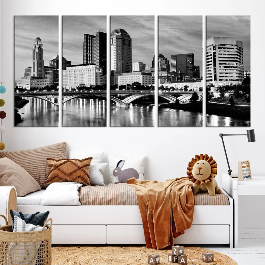 Columbus City Lights Skyline Black and White Wall Art Cityscape Canvas Print, featuring a city skyline over a river, is elegantly displayed.