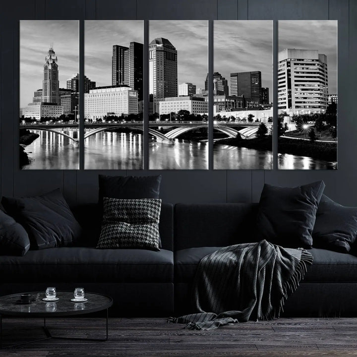 Columbus City Lights Skyline Black and White Wall Art Cityscape Canvas Print, featuring a city skyline over a river, is elegantly displayed.