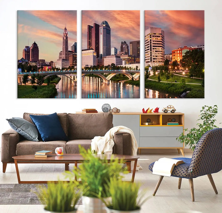 The "Columbus City Lights Sunset Orange Cloudy Skyline Cityscape View Wall Art Canvas Print" showcases a vibrant city skyline at sunset with a bridge spanning a river, strikingly displayed on museum-quality canvas.