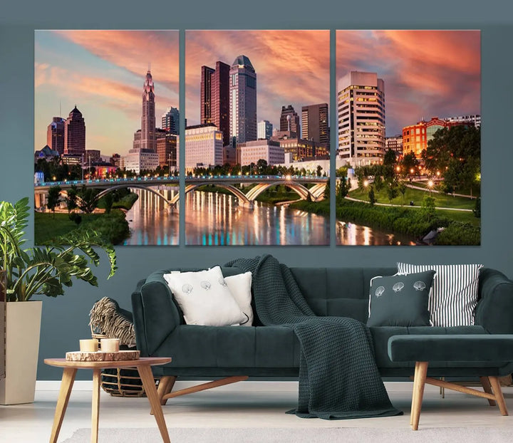 The "Columbus City Lights Sunset Orange Cloudy Skyline Cityscape View Wall Art Canvas Print" showcases a vibrant city skyline at sunset with a bridge spanning a river, strikingly displayed on museum-quality canvas.