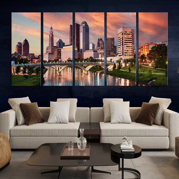 The "Columbus City Lights Sunset Orange Cloudy Skyline Cityscape View Wall Art Canvas Print" showcases a vibrant city skyline at sunset with a bridge spanning a river, strikingly displayed on museum-quality canvas.