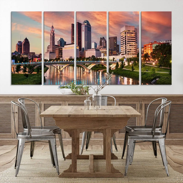 The "Columbus City Lights Sunset Orange Cloudy Skyline Cityscape View Wall Art Canvas Print" showcases a vibrant city skyline at sunset with a bridge spanning a river, strikingly displayed on museum-quality canvas.