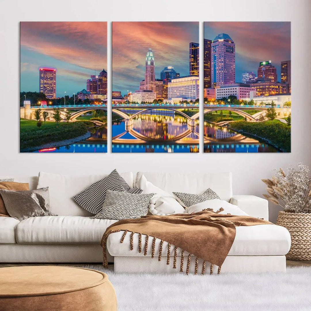 The living room features the Columbus City Lights Sunset Orange Cloudy Skyline Cityscape View Wall Art Canvas Print, designed to be museum-quality and ready to hang under warm lighting.