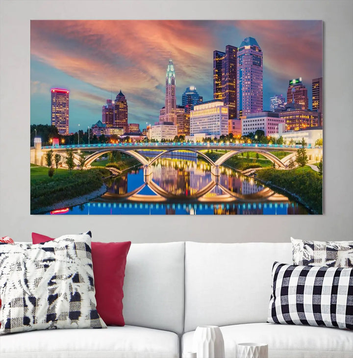 The living room features the Columbus City Lights Sunset Orange Cloudy Skyline Cityscape View Wall Art Canvas Print, designed to be museum-quality and ready to hang under warm lighting.