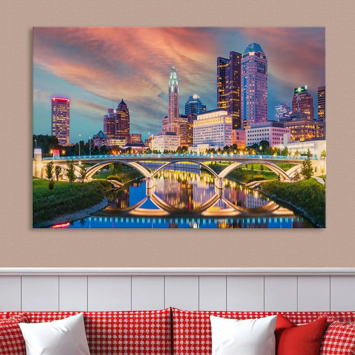 The living room features the Columbus City Lights Sunset Orange Cloudy Skyline Cityscape View Wall Art Canvas Print, designed to be museum-quality and ready to hang under warm lighting.