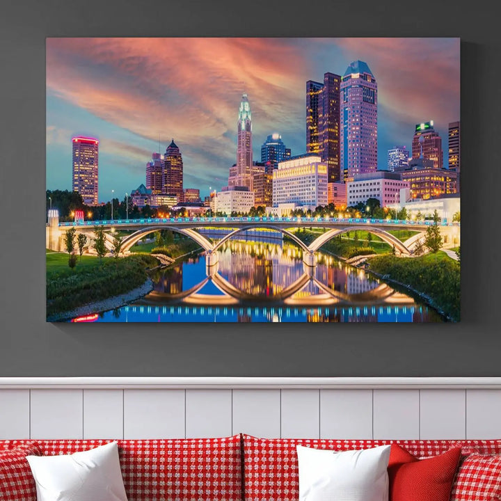 The living room features the Columbus City Lights Sunset Orange Cloudy Skyline Cityscape View Wall Art Canvas Print, designed to be museum-quality and ready to hang under warm lighting.