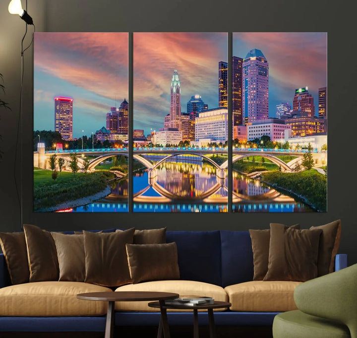 The living room features the Columbus City Lights Sunset Orange Cloudy Skyline Cityscape View Wall Art Canvas Print, designed to be museum-quality and ready to hang under warm lighting.