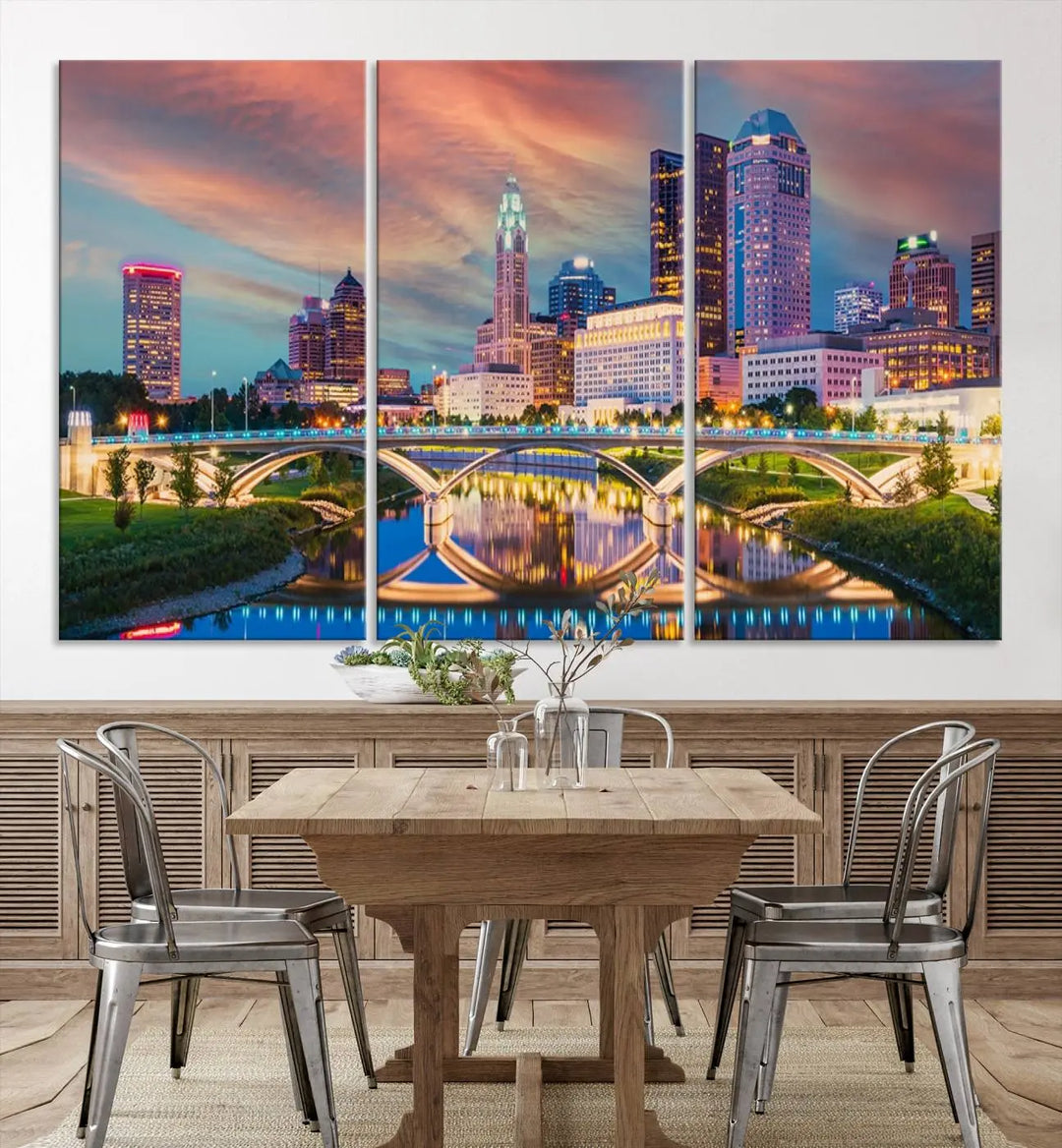 The living room features the Columbus City Lights Sunset Orange Cloudy Skyline Cityscape View Wall Art Canvas Print, designed to be museum-quality and ready to hang under warm lighting.