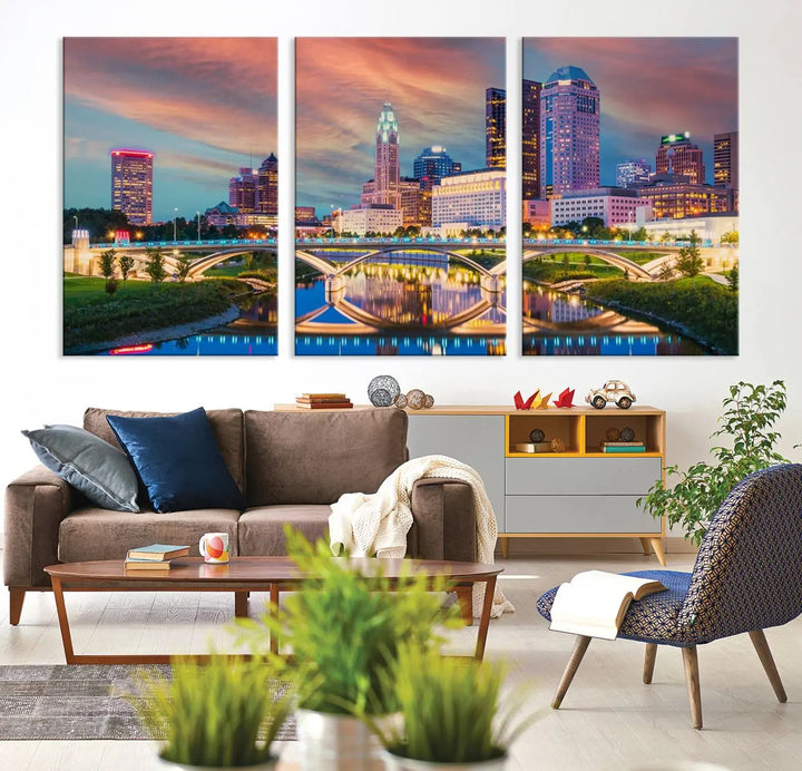 The living room features the Columbus City Lights Sunset Orange Cloudy Skyline Cityscape View Wall Art Canvas Print, designed to be museum-quality and ready to hang under warm lighting.