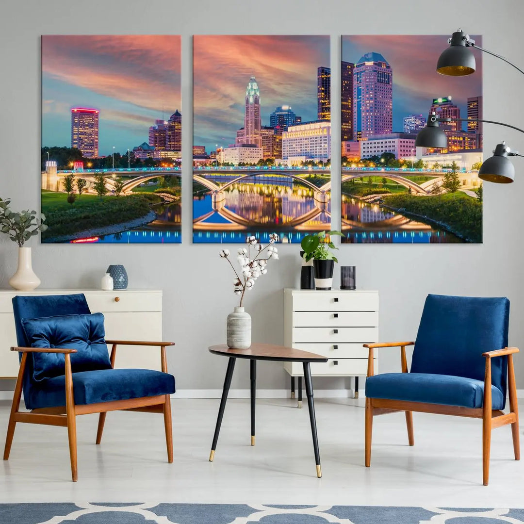 The living room features the Columbus City Lights Sunset Orange Cloudy Skyline Cityscape View Wall Art Canvas Print, designed to be museum-quality and ready to hang under warm lighting.