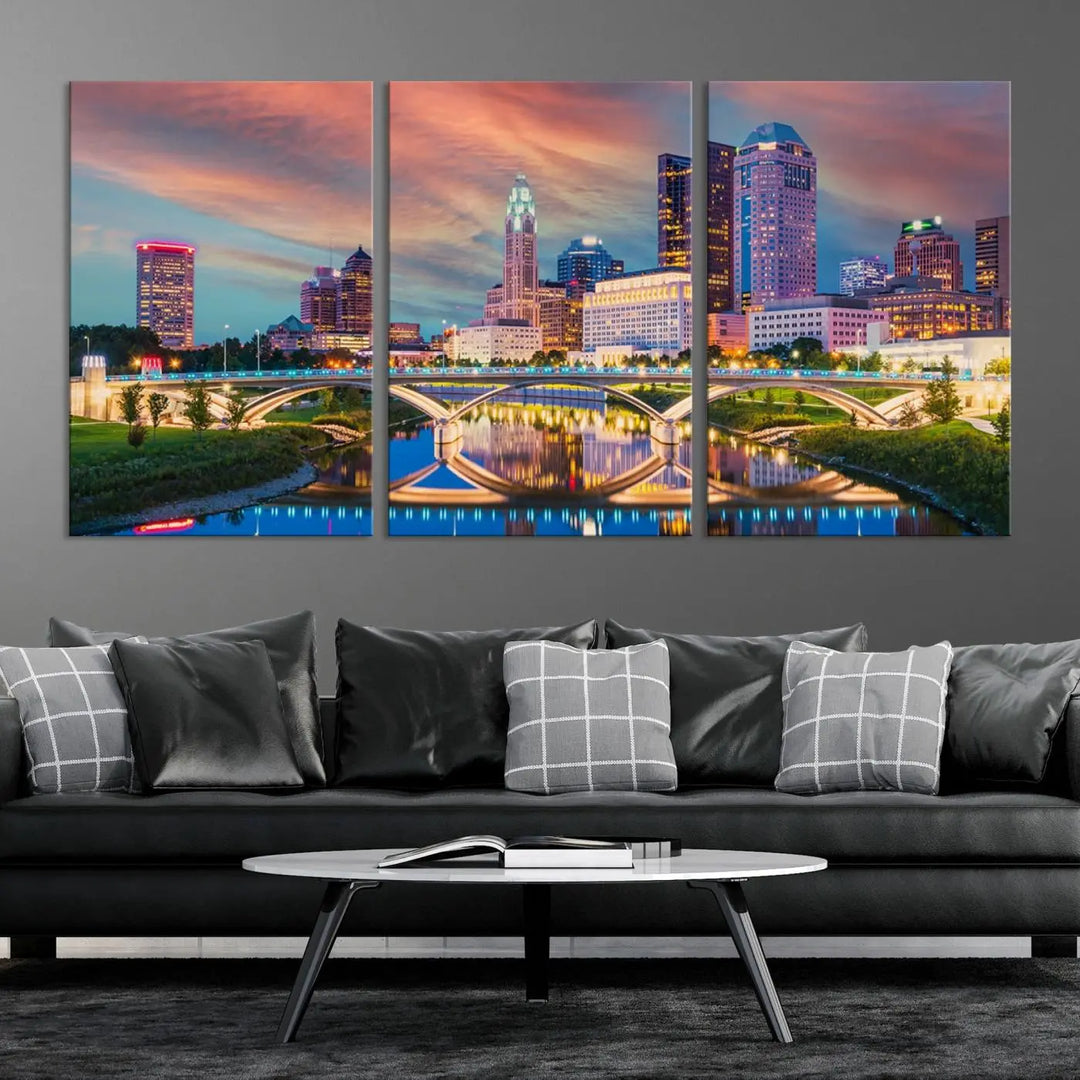 The living room features the Columbus City Lights Sunset Orange Cloudy Skyline Cityscape View Wall Art Canvas Print, designed to be museum-quality and ready to hang under warm lighting.