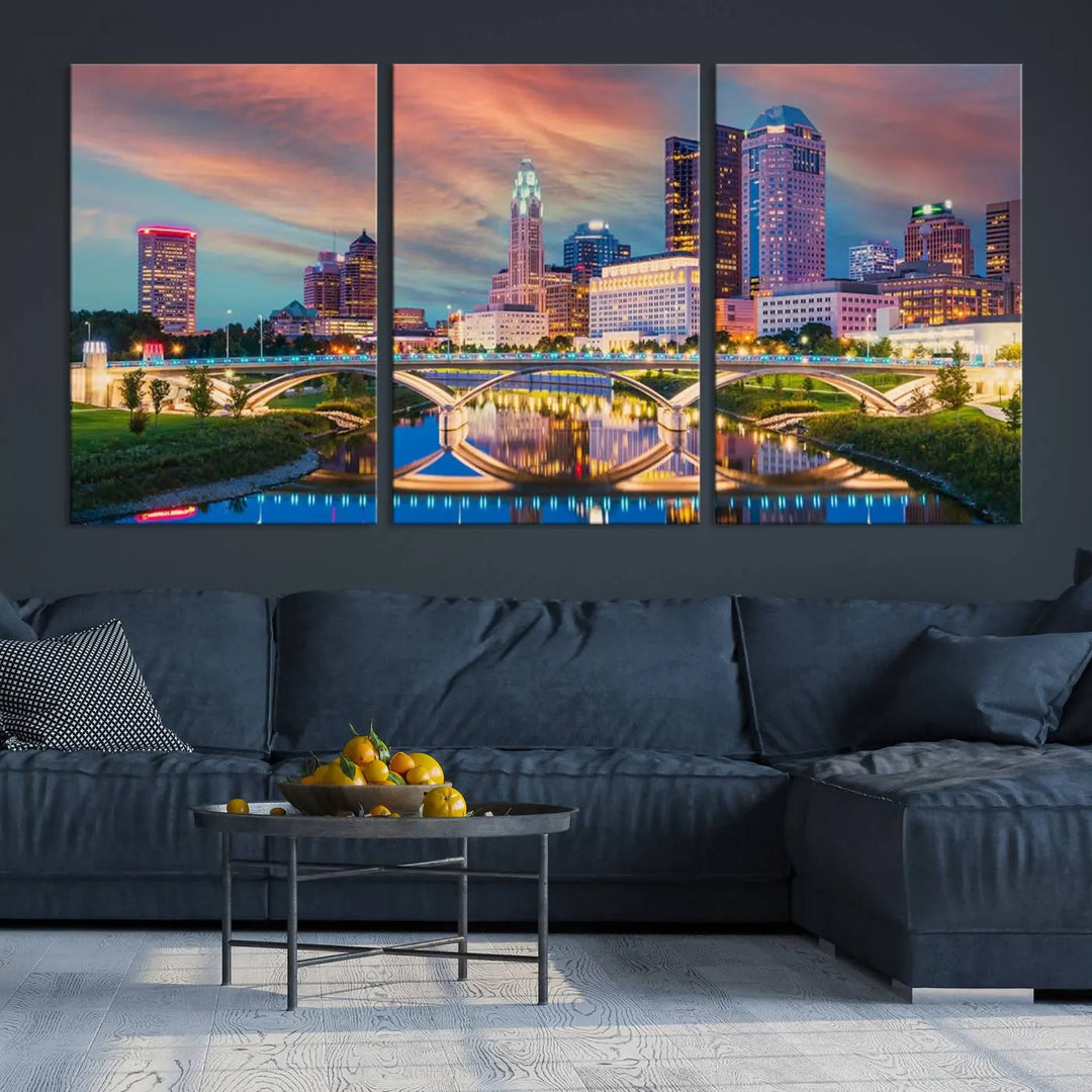 The living room features the Columbus City Lights Sunset Orange Cloudy Skyline Cityscape View Wall Art Canvas Print, designed to be museum-quality and ready to hang under warm lighting.