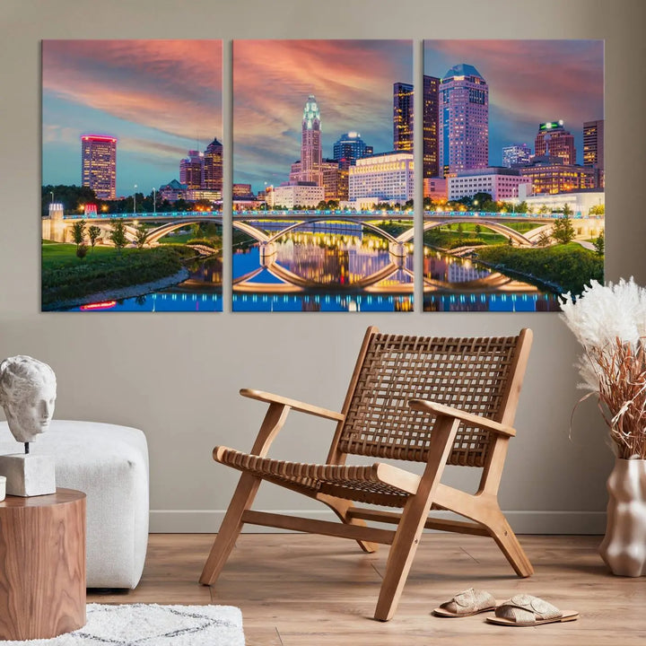 The living room features the Columbus City Lights Sunset Orange Cloudy Skyline Cityscape View Wall Art Canvas Print, designed to be museum-quality and ready to hang under warm lighting.