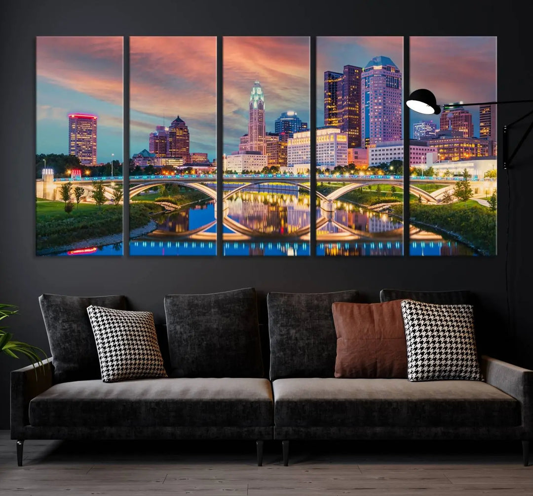 The living room features the Columbus City Lights Sunset Orange Cloudy Skyline Cityscape View Wall Art Canvas Print, designed to be museum-quality and ready to hang under warm lighting.