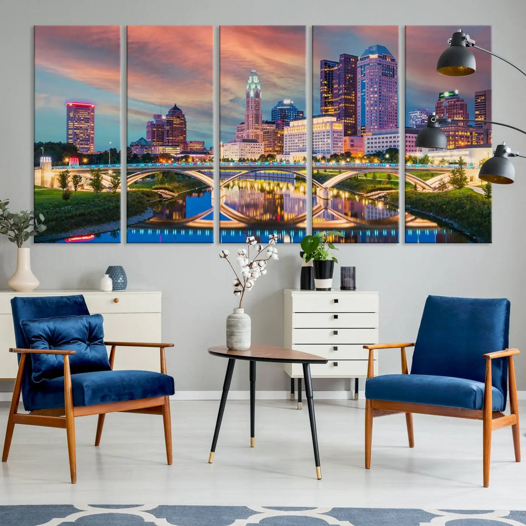 The living room features the Columbus City Lights Sunset Orange Cloudy Skyline Cityscape View Wall Art Canvas Print, designed to be museum-quality and ready to hang under warm lighting.