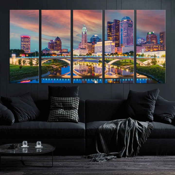 The living room features the Columbus City Lights Sunset Orange Cloudy Skyline Cityscape View Wall Art Canvas Print, designed to be museum-quality and ready to hang under warm lighting.