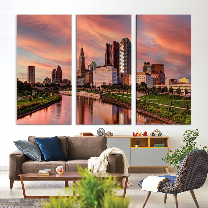 The Columbus City Lights Sunset Orange Cloudy Skyline Cityscape View Wall Art Canvas Print enhances the modern living room. This three-panel piece of the city skyline at sunset is printed on museum-quality canvas, ready to hang, and features a UV-protective coating for lasting brilliance.