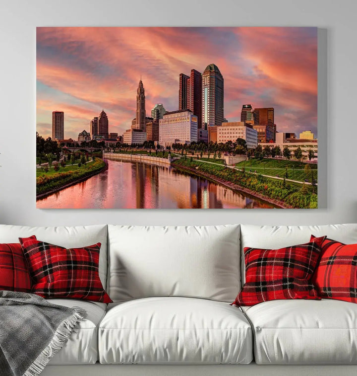 The Columbus City Lights Sunset Orange Cloudy Skyline Cityscape View Wall Art Canvas Print enhances the modern living room. This three-panel piece of the city skyline at sunset is printed on museum-quality canvas, ready to hang, and features a UV-protective coating for lasting brilliance.