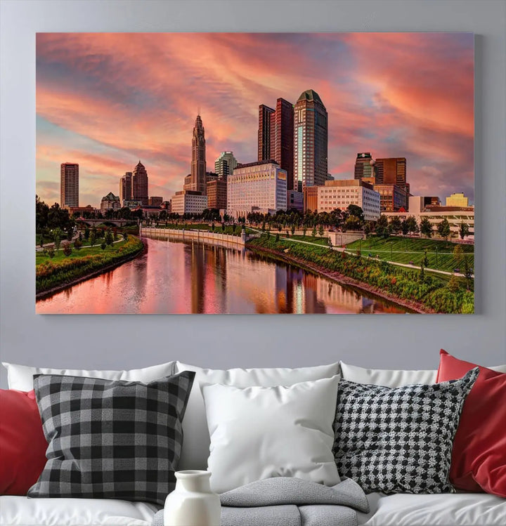 The Columbus City Lights Sunset Orange Cloudy Skyline Cityscape View Wall Art Canvas Print enhances the modern living room. This three-panel piece of the city skyline at sunset is printed on museum-quality canvas, ready to hang, and features a UV-protective coating for lasting brilliance.