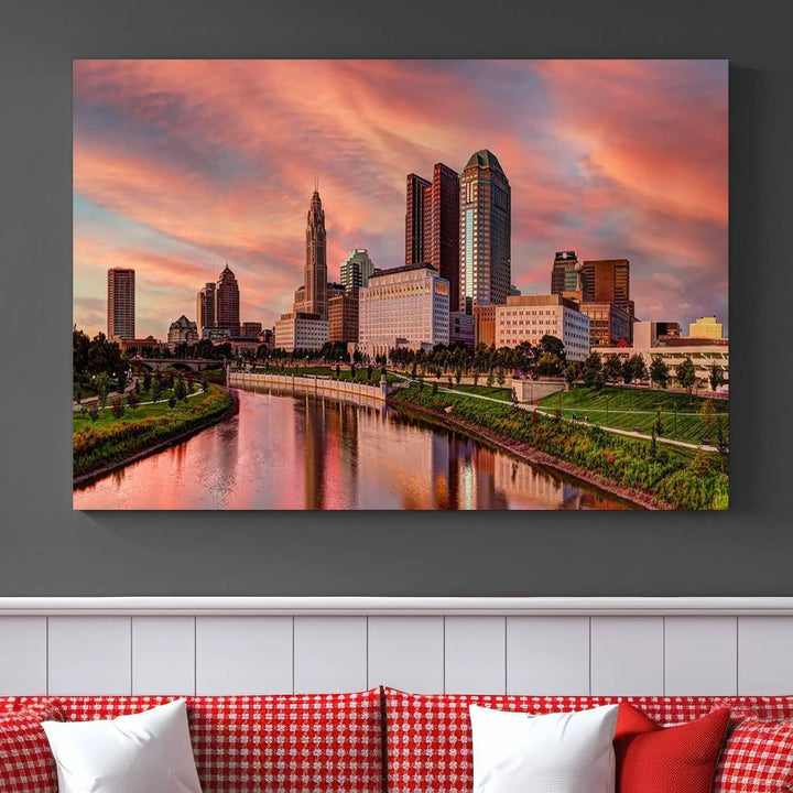 The Columbus City Lights Sunset Orange Cloudy Skyline Cityscape View Wall Art Canvas Print enhances the modern living room. This three-panel piece of the city skyline at sunset is printed on museum-quality canvas, ready to hang, and features a UV-protective coating for lasting brilliance.