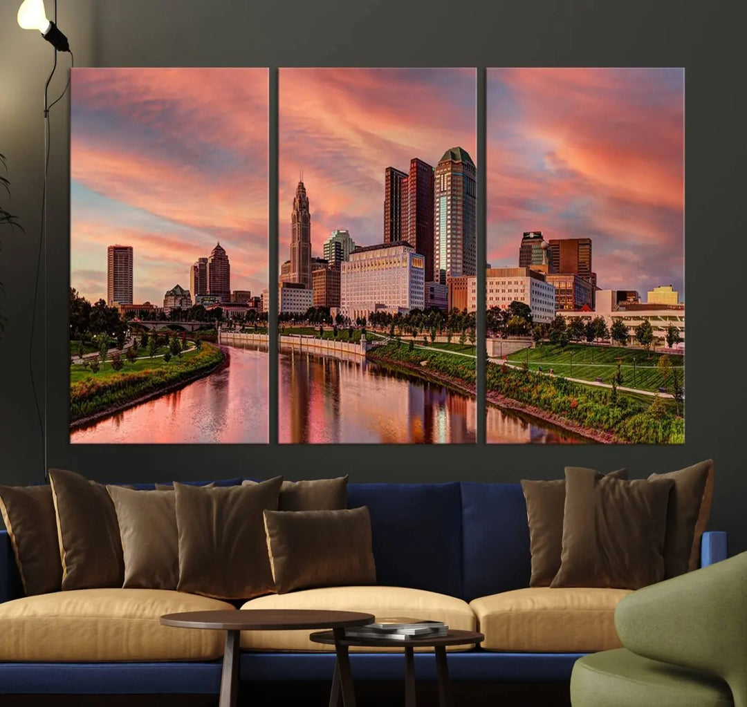 The Columbus City Lights Sunset Orange Cloudy Skyline Cityscape View Wall Art Canvas Print enhances the modern living room. This three-panel piece of the city skyline at sunset is printed on museum-quality canvas, ready to hang, and features a UV-protective coating for lasting brilliance.