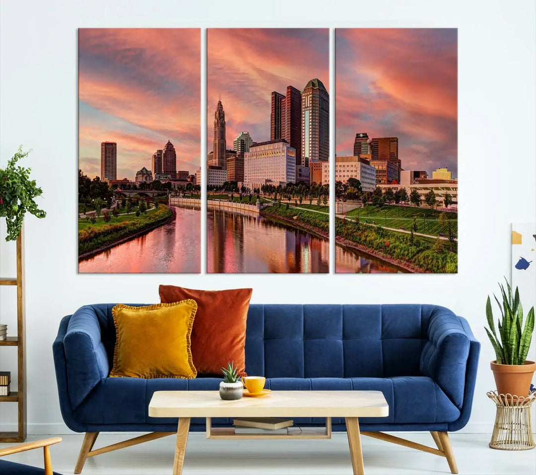 The Columbus City Lights Sunset Orange Cloudy Skyline Cityscape View Wall Art Canvas Print enhances the modern living room. This three-panel piece of the city skyline at sunset is printed on museum-quality canvas, ready to hang, and features a UV-protective coating for lasting brilliance.