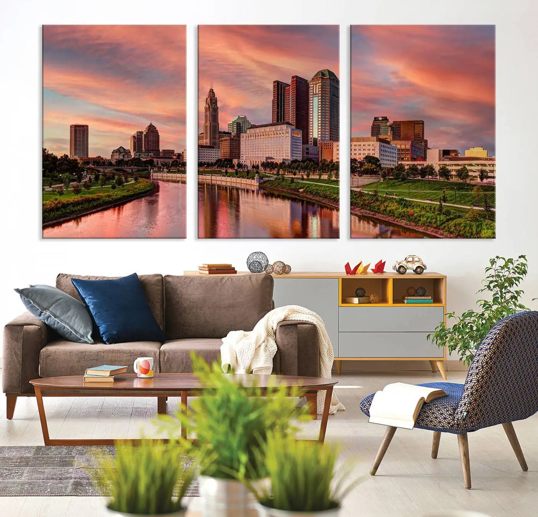 The Columbus City Lights Sunset Orange Cloudy Skyline Cityscape View Wall Art Canvas Print enhances the modern living room. This three-panel piece of the city skyline at sunset is printed on museum-quality canvas, ready to hang, and features a UV-protective coating for lasting brilliance.