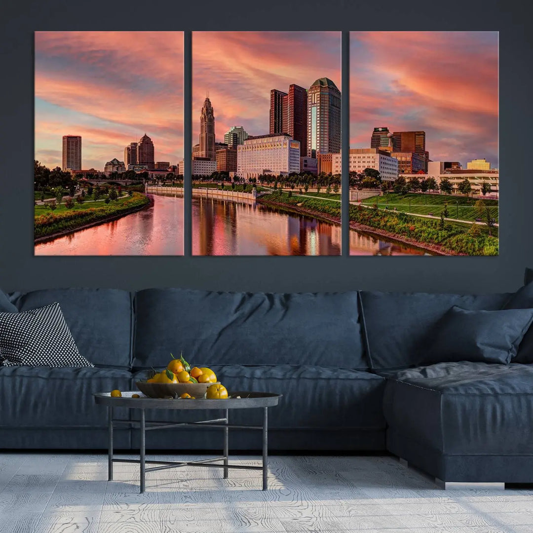 The Columbus City Lights Sunset Orange Cloudy Skyline Cityscape View Wall Art Canvas Print enhances the modern living room. This three-panel piece of the city skyline at sunset is printed on museum-quality canvas, ready to hang, and features a UV-protective coating for lasting brilliance.