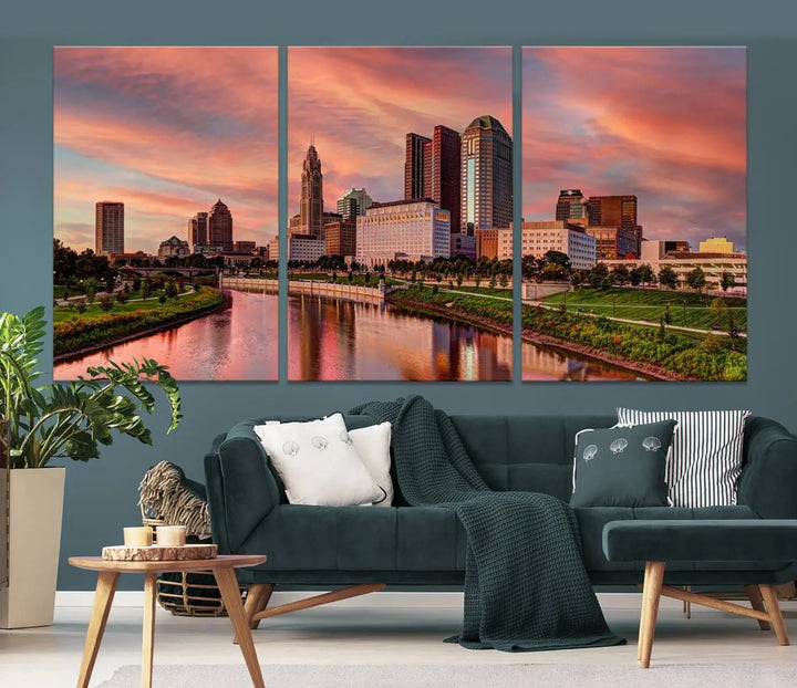 The Columbus City Lights Sunset Orange Cloudy Skyline Cityscape View Wall Art Canvas Print enhances the modern living room. This three-panel piece of the city skyline at sunset is printed on museum-quality canvas, ready to hang, and features a UV-protective coating for lasting brilliance.