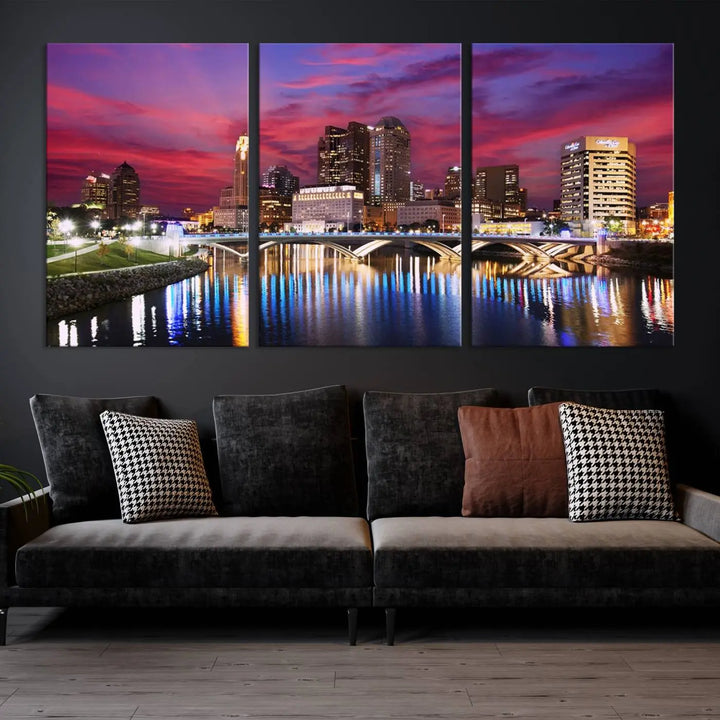 The "Columbus City Lights Sunset Pink and Purple Cloudy Skyline Cityscape View Wall Art Canvas Print" captures the beauty of a city skyline at dusk with its reflection on the river. Crafted on museum-quality canvas with a UV-protective coating, this triptych wall art is ready to hang and adds an elegant touch to any room.