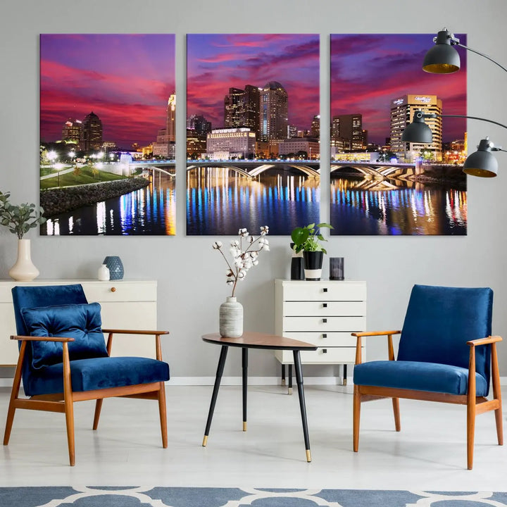 The "Columbus City Lights Sunset Pink and Purple Cloudy Skyline Cityscape View Wall Art Canvas Print" captures the beauty of a city skyline at dusk with its reflection on the river. Crafted on museum-quality canvas with a UV-protective coating, this triptych wall art is ready to hang and adds an elegant touch to any room.