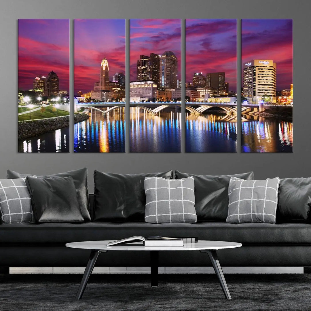 The "Columbus City Lights Sunset Pink and Purple Cloudy Skyline Cityscape View Wall Art Canvas Print" captures the beauty of a city skyline at dusk with its reflection on the river. Crafted on museum-quality canvas with a UV-protective coating, this triptych wall art is ready to hang and adds an elegant touch to any room.