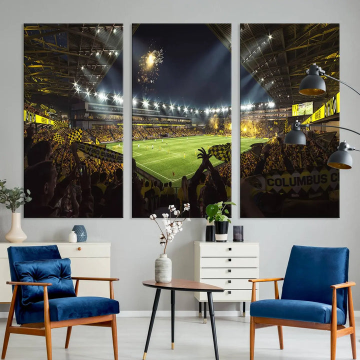 The wall of a modern living room is adorned with a triptych canvas titled "Columbus Crew Soccer Team Print," capturing the vibrant energy of the Columbus Crew Stadium in high-resolution printing.