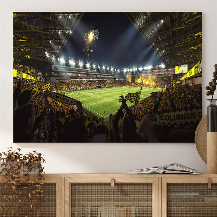 The wall of a modern living room is adorned with a triptych canvas titled "Columbus Crew Soccer Team Print," capturing the vibrant energy of the Columbus Crew Stadium in high-resolution printing.