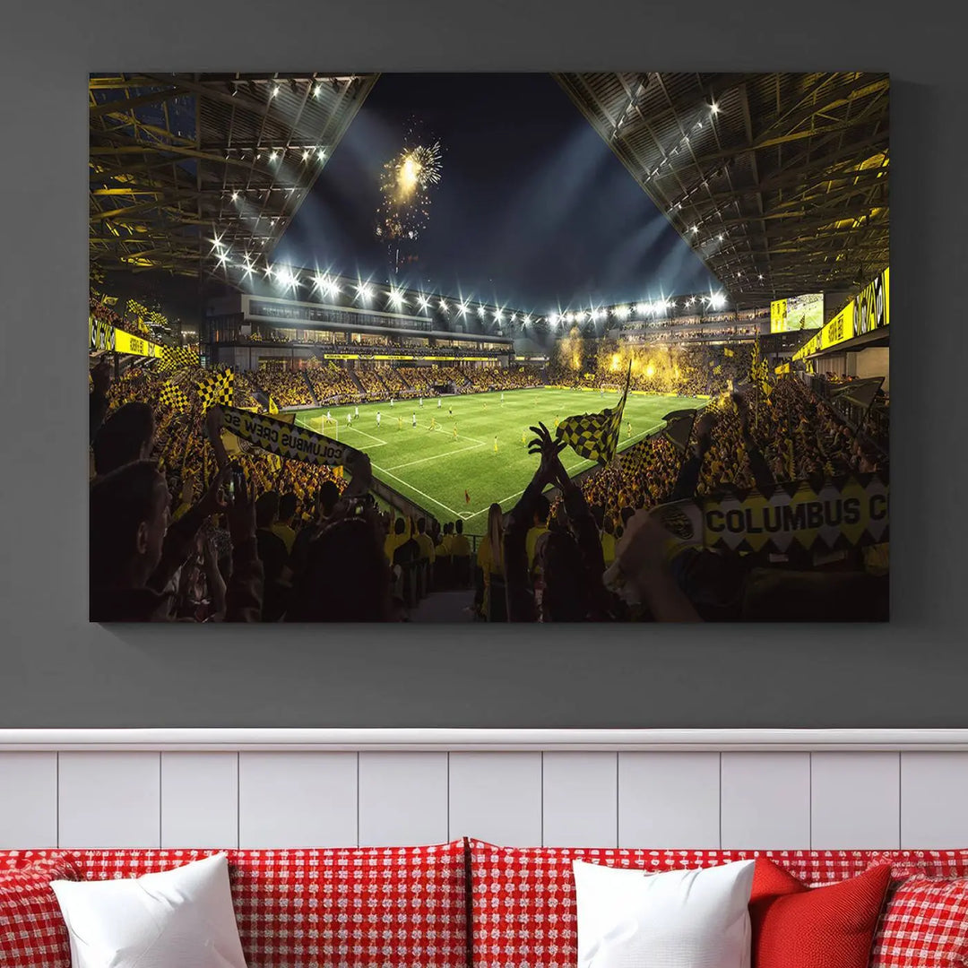 The wall of a modern living room is adorned with a triptych canvas titled "Columbus Crew Soccer Team Print," capturing the vibrant energy of the Columbus Crew Stadium in high-resolution printing.