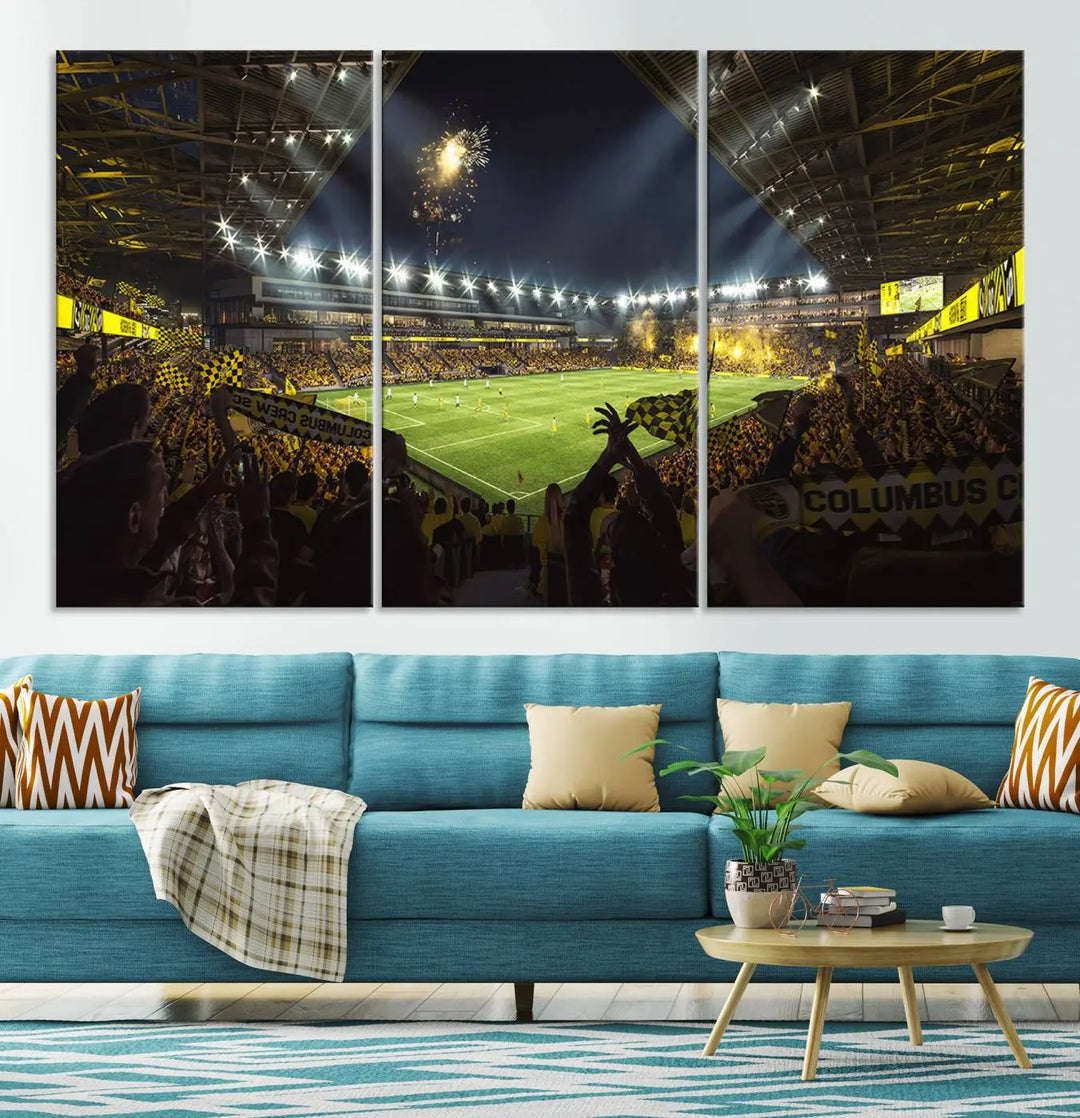 The wall of a modern living room is adorned with a triptych canvas titled "Columbus Crew Soccer Team Print," capturing the vibrant energy of the Columbus Crew Stadium in high-resolution printing.