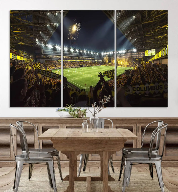 The wall of a modern living room is adorned with a triptych canvas titled "Columbus Crew Soccer Team Print," capturing the vibrant energy of the Columbus Crew Stadium in high-resolution printing.