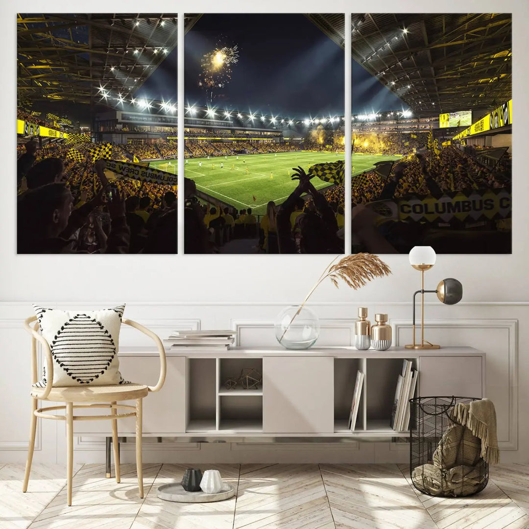 The wall of a modern living room is adorned with a triptych canvas titled "Columbus Crew Soccer Team Print," capturing the vibrant energy of the Columbus Crew Stadium in high-resolution printing.