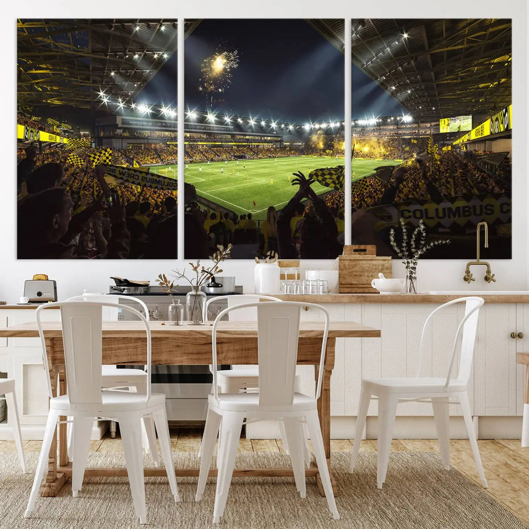 The wall of a modern living room is adorned with a triptych canvas titled "Columbus Crew Soccer Team Print," capturing the vibrant energy of the Columbus Crew Stadium in high-resolution printing.