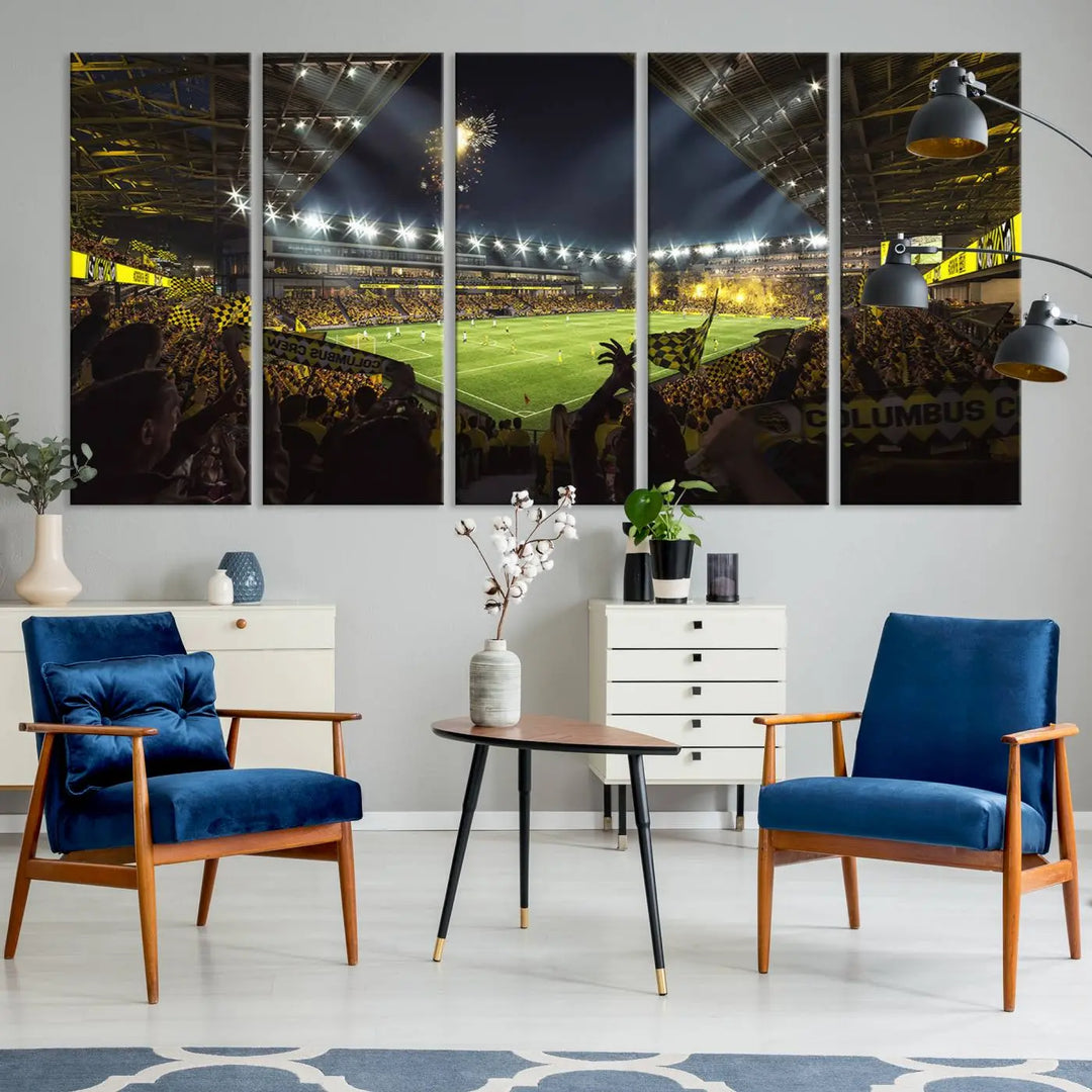 The wall of a modern living room is adorned with a triptych canvas titled "Columbus Crew Soccer Team Print," capturing the vibrant energy of the Columbus Crew Stadium in high-resolution printing.