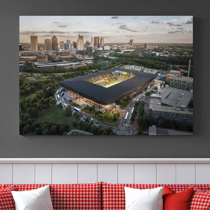 A living room is adorned with the Columbus Crew Soccer Team Print, showcasing a triptych of Columbus Crew Stadium and cityscape on museum-quality canvas. The high-resolution printing ensures vivid detail, while a UV-protective coating preserves its brilliance.