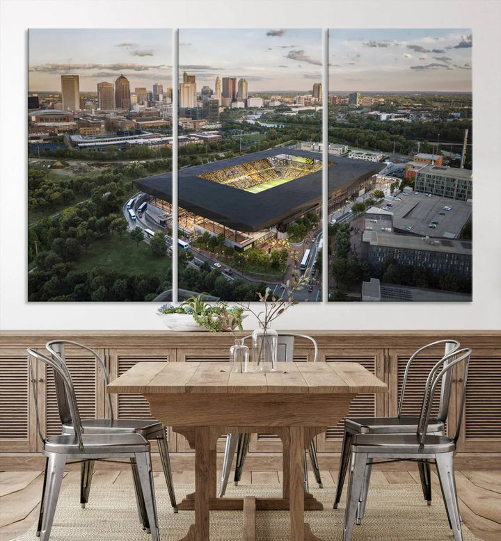 A living room is adorned with the Columbus Crew Soccer Team Print, showcasing a triptych of Columbus Crew Stadium and cityscape on museum-quality canvas. The high-resolution printing ensures vivid detail, while a UV-protective coating preserves its brilliance.