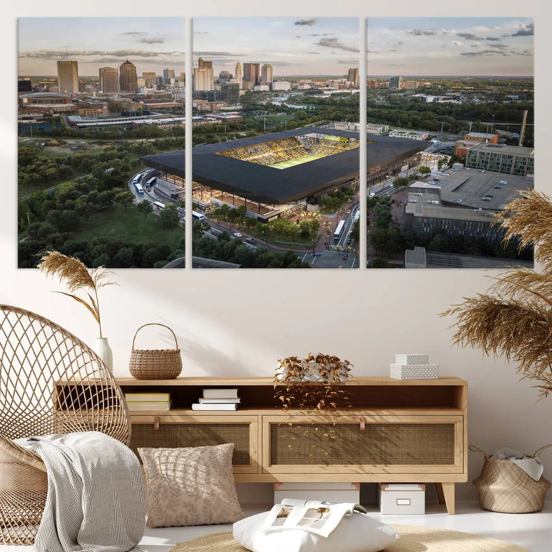 A living room is adorned with the Columbus Crew Soccer Team Print, showcasing a triptych of Columbus Crew Stadium and cityscape on museum-quality canvas. The high-resolution printing ensures vivid detail, while a UV-protective coating preserves its brilliance.