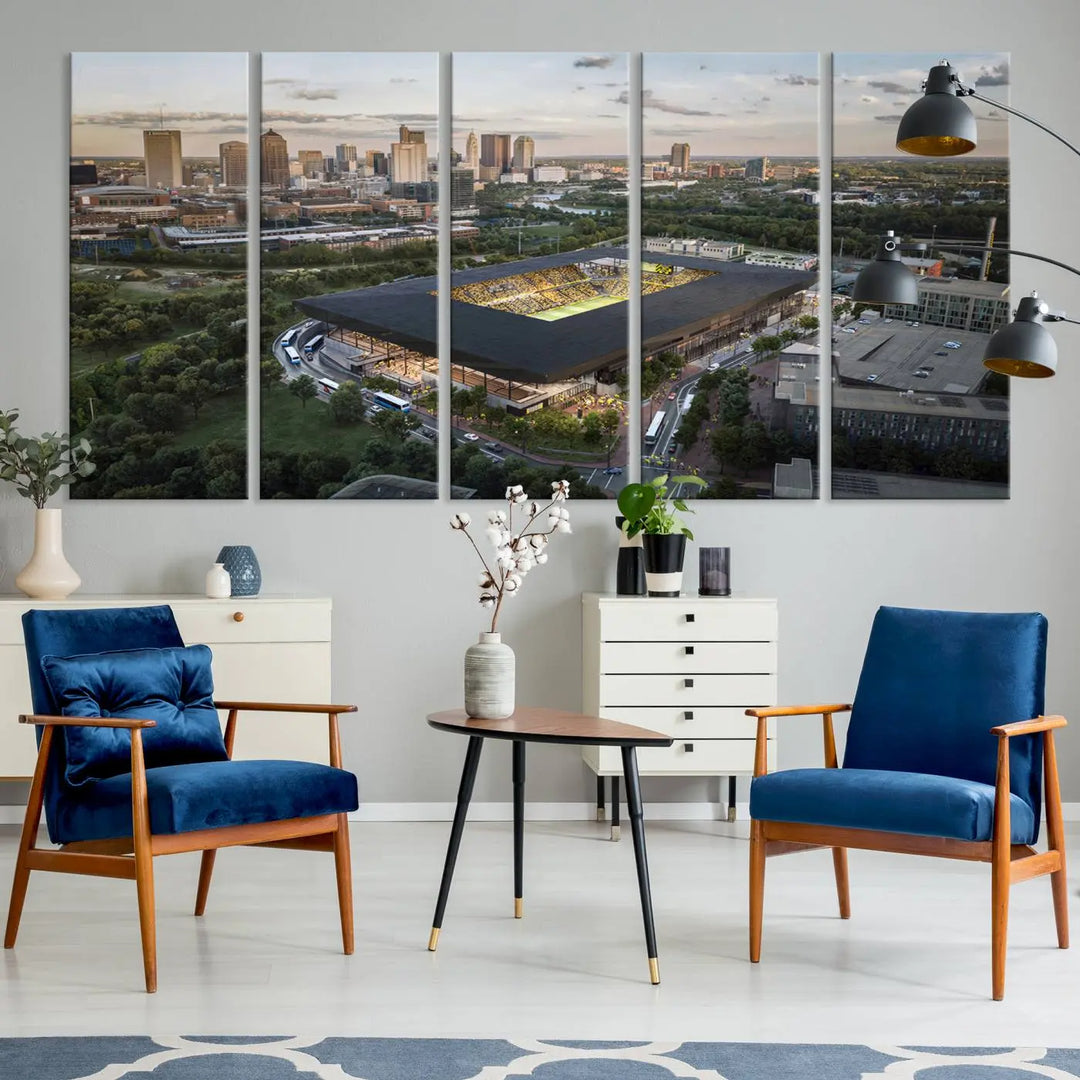 A living room is adorned with the Columbus Crew Soccer Team Print, showcasing a triptych of Columbus Crew Stadium and cityscape on museum-quality canvas. The high-resolution printing ensures vivid detail, while a UV-protective coating preserves its brilliance.