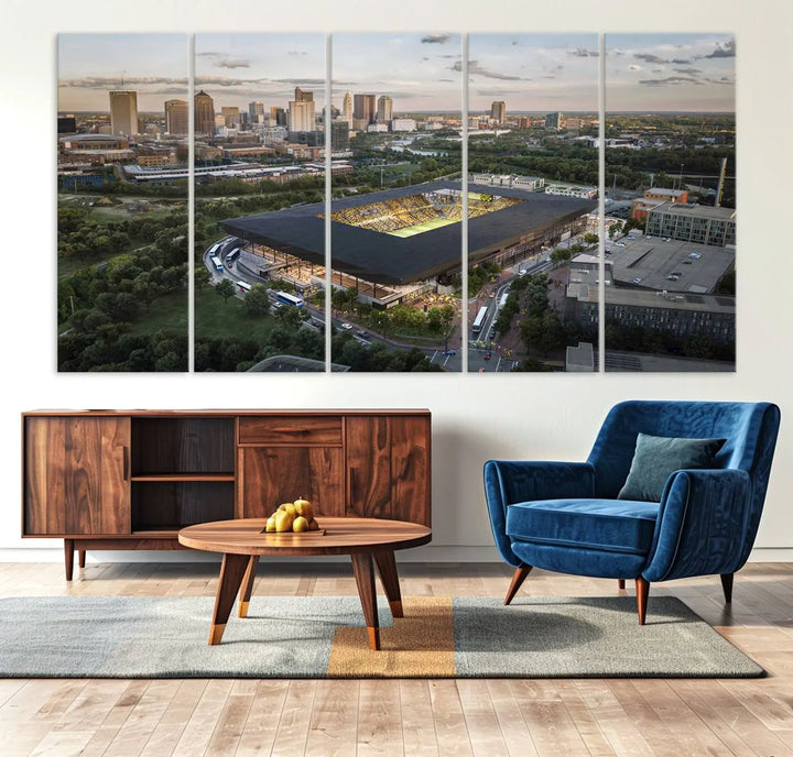 A living room is adorned with the Columbus Crew Soccer Team Print, showcasing a triptych of Columbus Crew Stadium and cityscape on museum-quality canvas. The high-resolution printing ensures vivid detail, while a UV-protective coating preserves its brilliance.