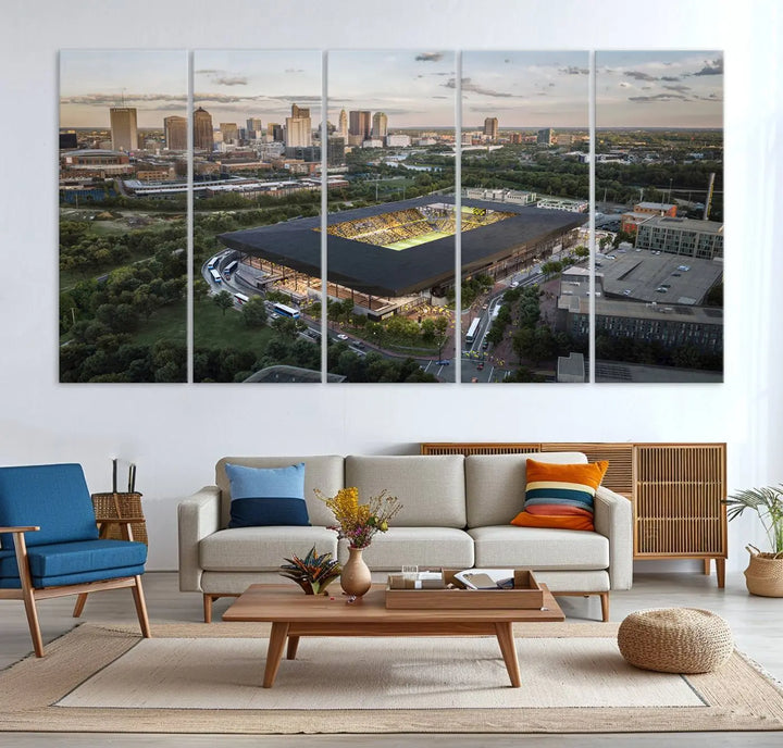 A living room is adorned with the Columbus Crew Soccer Team Print, showcasing a triptych of Columbus Crew Stadium and cityscape on museum-quality canvas. The high-resolution printing ensures vivid detail, while a UV-protective coating preserves its brilliance.