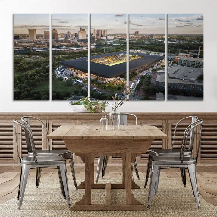 A living room is adorned with the Columbus Crew Soccer Team Print, showcasing a triptych of Columbus Crew Stadium and cityscape on museum-quality canvas. The high-resolution printing ensures vivid detail, while a UV-protective coating preserves its brilliance.